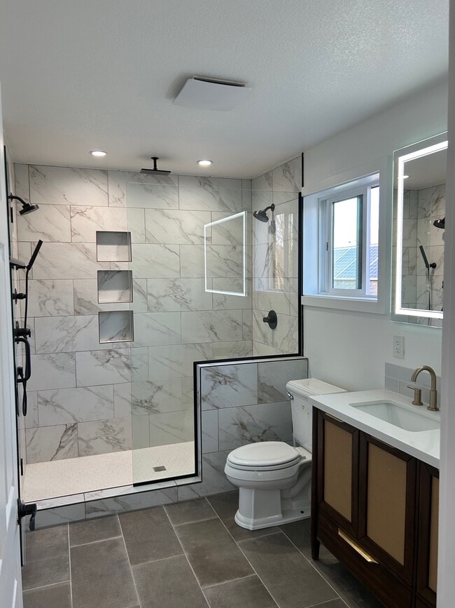 Master bedroom with walk in shower and double vainity & heated flooring