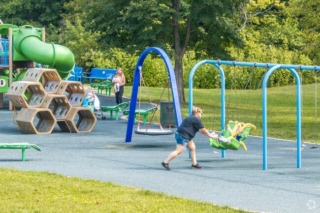 The modern and unique playground in Ewing Park will keep children entertained for hours.