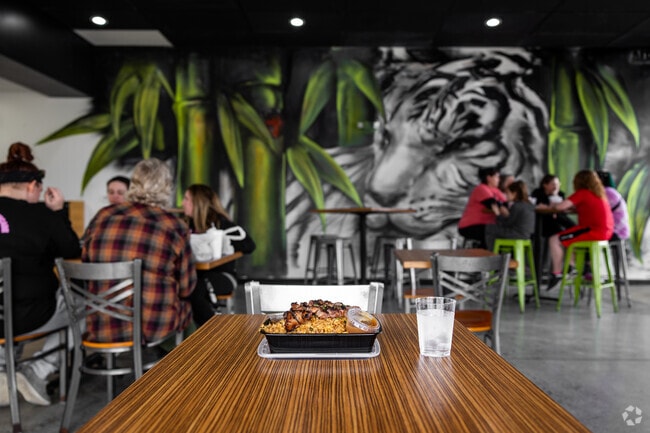 Grab a bite to eat at Tiger Rice near Indian Hills Riverbend.