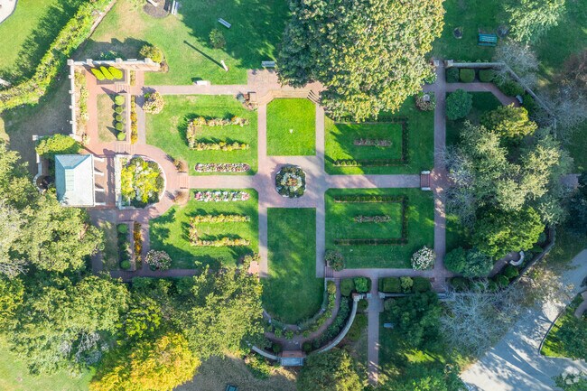 Meander through the Italianate rose garden at Lynch Park in Downtown Beverly.