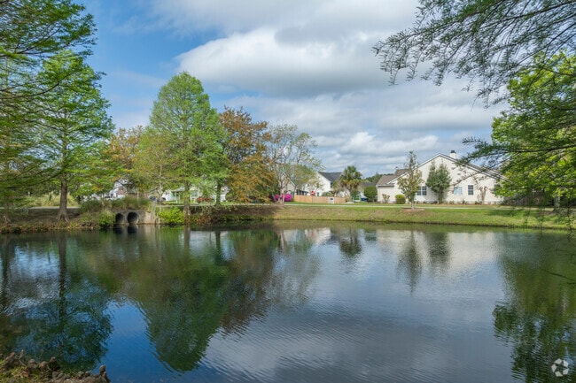 Evening walks past peaceful ponds in Village Green are perfect for reconnecting with neighbors.
