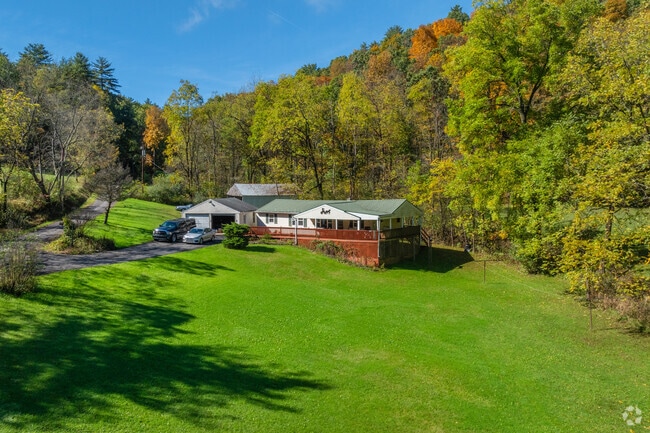 Curtin’s ranch homes with hillside decks offer warmth and scenic views for local residents.