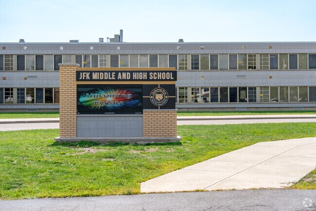 John F. Kennedy High School is connected to the middle school and has a B grade on Niche.