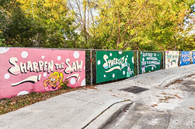 Bonneau children beautify their shcool with murals along the entrance.