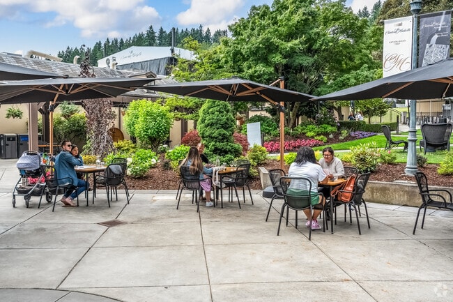 Downtown Woodinville residents enjoying a tasty meal and wine at one of the many wineries.