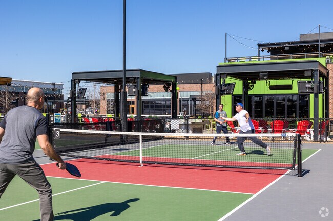 Chicken N Pickle is the perfect place to hone your pickleball skills and grab a bit to eat after