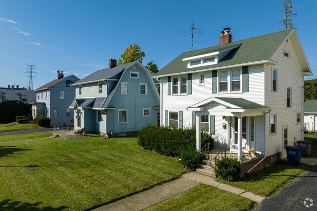 Colonial and Dutch Colonial inspired homes in Beverly feature set back garages.