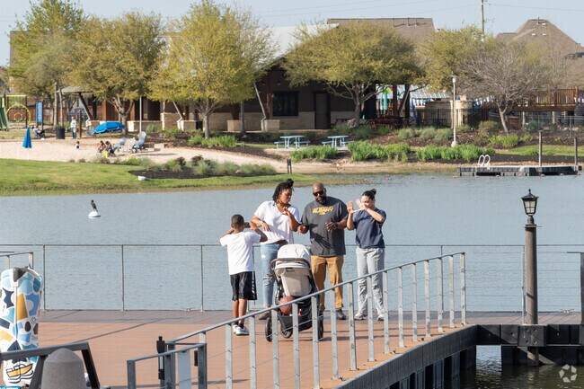 Many shopping centers are close to lakes that have walking paths for family gatherings.