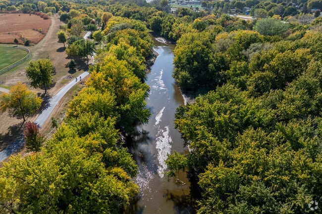 Big Sioux River flows south past Sioux Falls and enters the Missouri River near Sioux City.