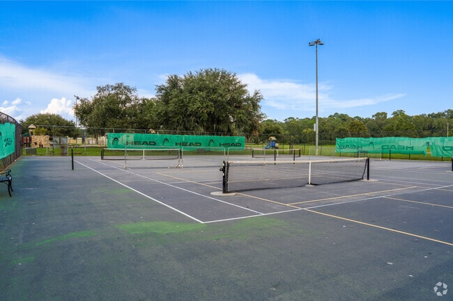 One of the many amenities offered at Lake Mayer Park include multiple tennis courts.