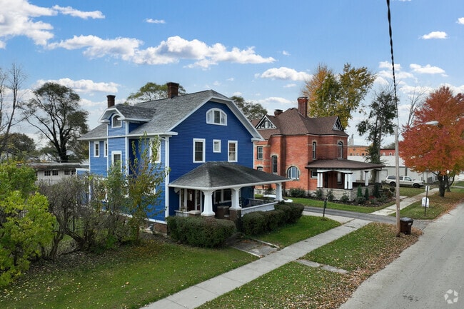 Two story historic homes line the neighborhood streets of Fostoria, OH