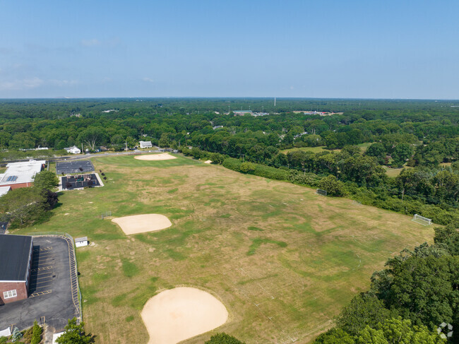 Clayton Huey Elementary School features 3 baseball diamonds in the back.