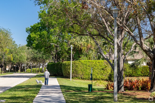 Autumn Woods residents enjoy walking their pets along the wide pathways.