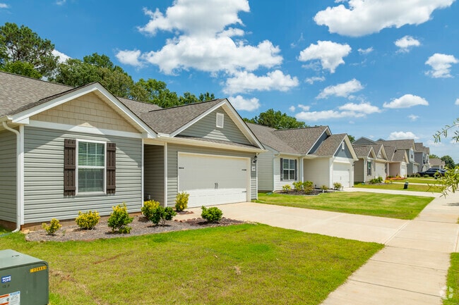 Manicured lawns and beautiful communities make up a majority of the Bradfield Farms area.