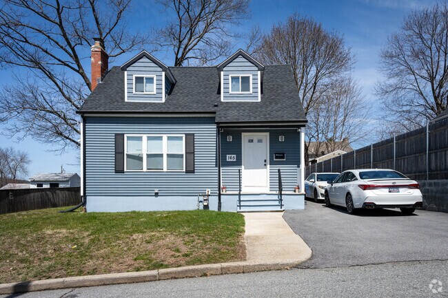 Discover timeless elegance in this single family colonial home in Laurel Hill, Cranston.