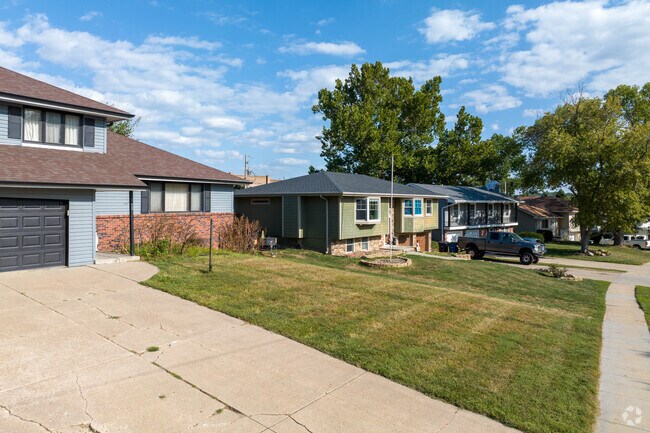 Many homes in the Brook Hollow neighborhood have large yards.