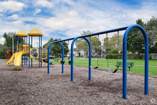 The swings and playground are very popular in the Syosset s01 Park in Syosset NY