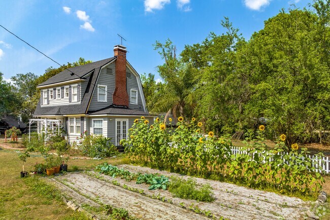 Grow your own garden beside your Farmhouse style home in the Gordon Heights neighborhood.