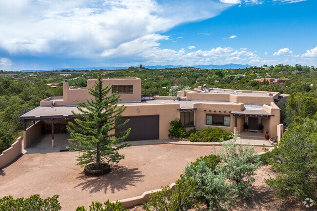 Juniper and pinyon trees surround most homes in the beauftul neighborhood of Vista Encantada.