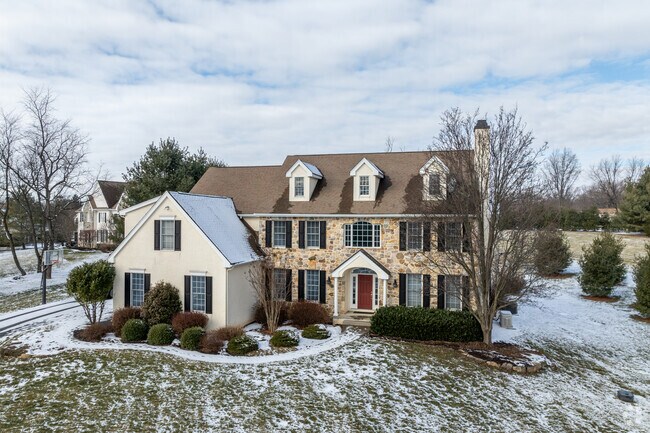 This three-story, new construction home sits on a very large lot in Warwick.