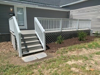 Brightly painted and landscaped entry. Park right at your front steps