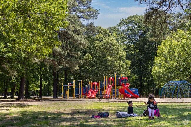 Kids enjoy the playground at Briarfield Park, just minutes from Parkview homes and schools.