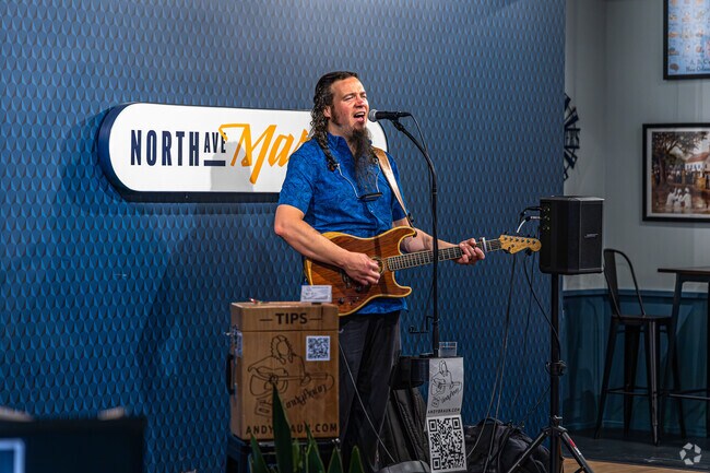 Catch live music on Thursday nights at the North Avenue Market in Uptown.