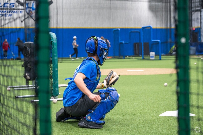 Whitman residents work on their hand-eye coordination at East Coast Eagles Baseball.