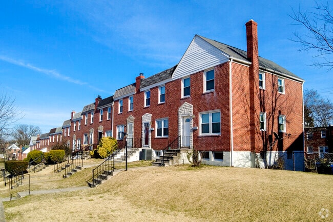 Families in Yale Heights enjoy row homes with green spaces ideal for play and relaxation.