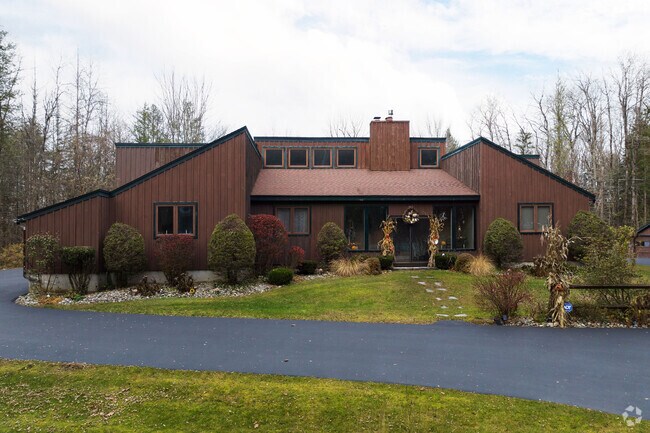 A modern home with wood siding in Galway.