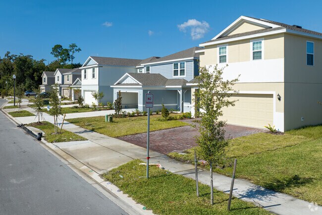 In Intercession City, vibrant color hues accentuate this row of homes.