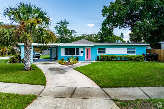 A brightly blue, mid-century style home adds character to the Audubon Park neighborhood.