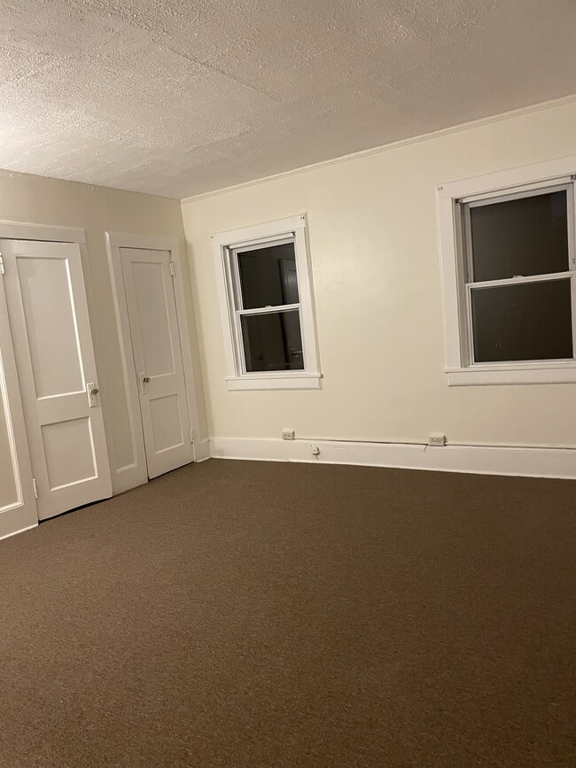 Primary bedroom - lots of closets and windows