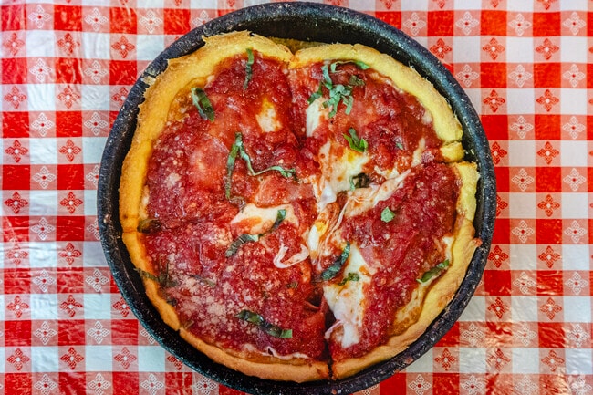 Ginos East brings deep dish to the Mag Mile with a variety of in house pies and casual dining.