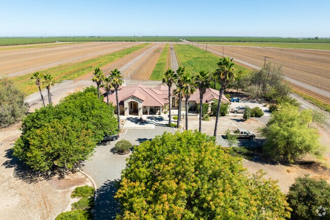 Farmhouse near San Joaquin offers privacy among agricultural fields.