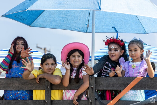 Kids in Norwalk attend good schools along with fun events like the Halloween Parade.