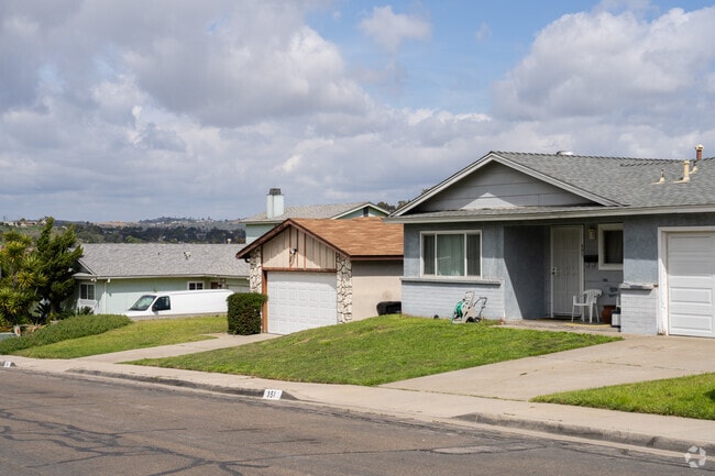 Rows of mid-century homes line the streets of Lincoln Park, San Diego.