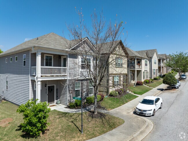 A row of beautiful townhomes in the Cascades neighborhood in Mays Georgia.