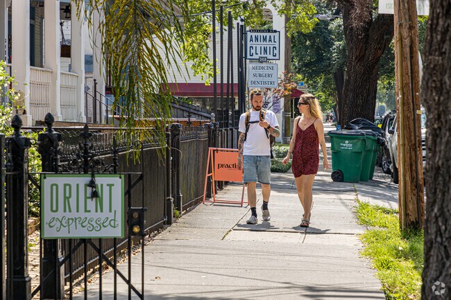 Residents and tourists alike often walk along Magazine St near the Irish Channel.