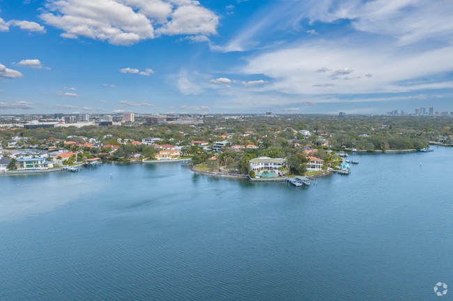 Larger homes line the water's edge and smaller homes are more inland.