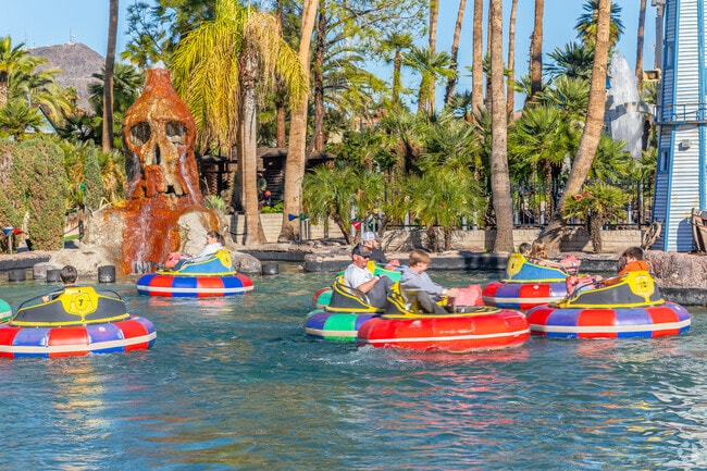 Families enjoy splashing fun on bumper boats at North Mountain Village's Castles and Coasters.