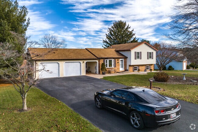 Spacious ranch style home with 2 car garage and a unique breezeway in Mt. Airy.