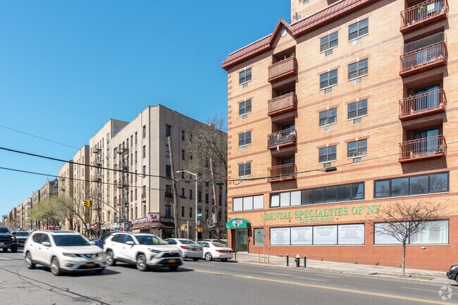 East Gunhill Road has a mix of  large apartment buildings and local businesses in Norwood.
