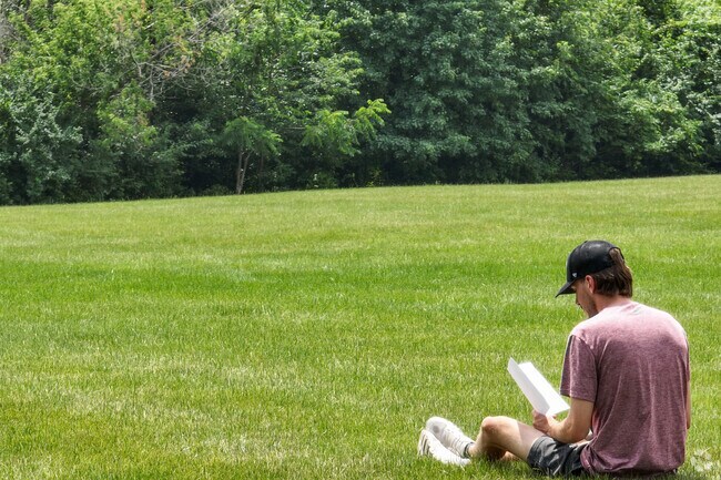 Residents of River Run enjoy reading at the River Run Preserve South.