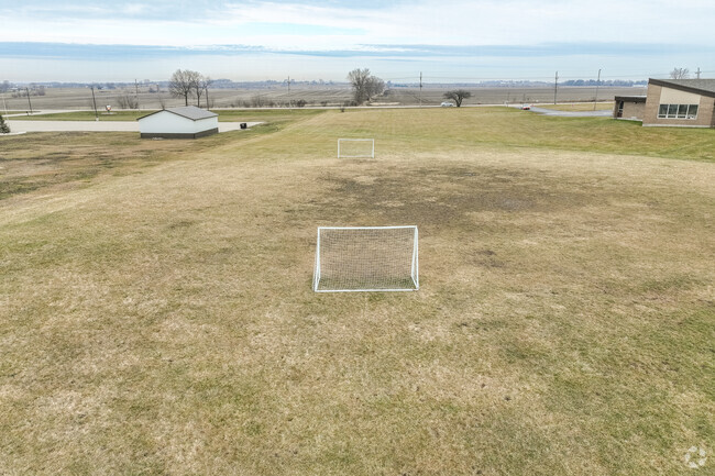 Monroe Center School has a small soccer goal area.