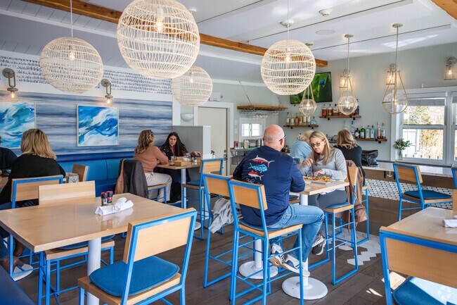 Delight in seafood and picturesque bay views at Wickford On The Water just minutes from Cold Spring Beach, RI.