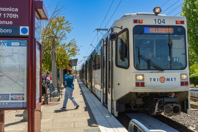 Take the TriMet light rail from Elmonica Station in Five Oaks into Portland or Hillsboro.