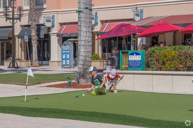 Boca del Mar residents gather at Mizner Park for shopping, dining, and family fun.
