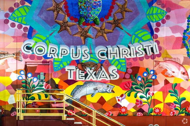 The City of Corpus Christi flamboyant murals representative of the local lifestyle line the streets of the Bay Area.