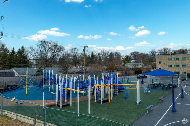 Playgrounds buzz with laughter at St. Charles Borromeo School.
